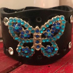 Leather cuff with Butterfly brooch